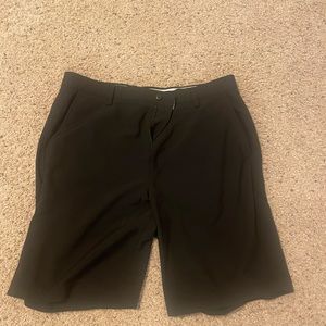 Lightly used black footjoy shorts . 36 waist